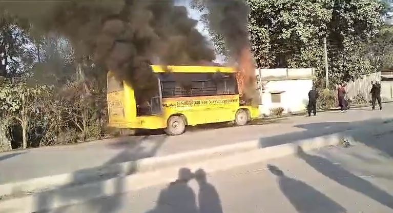 fire school bus on road