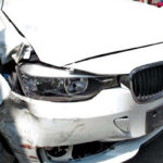 Minors bike collides with bmw car owner